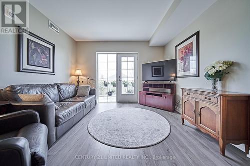 315 - 21 Brookhouse Drive, Clarington, ON - Indoor Photo Showing Living Room