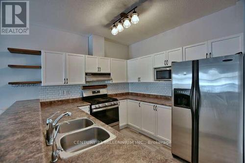 38 Admiral Drive, Wasaga Beach, ON - Indoor Photo Showing Kitchen With Stainless Steel Kitchen With Double Sink