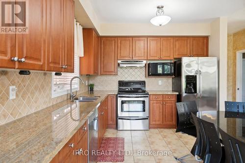 6829 Golden Hills Way, Mississauga, ON - Indoor Photo Showing Kitchen With Double Sink