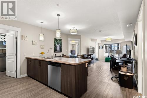 #125 5301 Universal Crescent, Regina, SK - Indoor Photo Showing Kitchen With Double Sink With Upgraded Kitchen