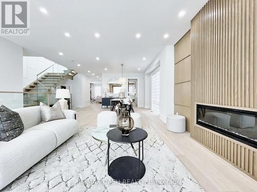 10 Sultana Avenue, Toronto, ON - Indoor Photo Showing Living Room With Fireplace