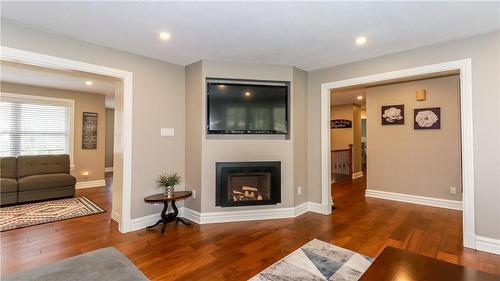 79 Kingfisher Crescent, Tiny, ON - Indoor Photo Showing Living Room With Fireplace
