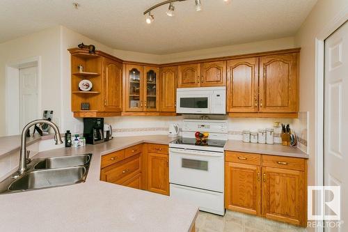 9730 174 St Nw, Edmonton, AB - Indoor Photo Showing Kitchen With Double Sink
