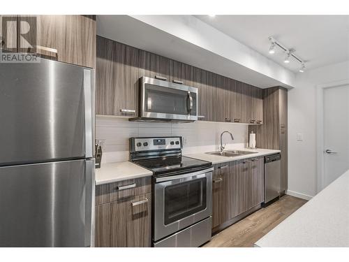 775 Academy Way Unit# 120, Kelowna, BC - Indoor Photo Showing Kitchen With Stainless Steel Kitchen With Double Sink