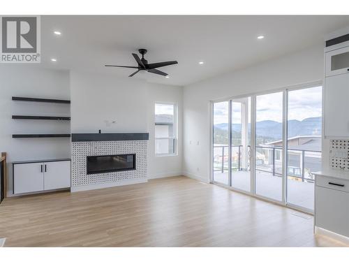 1074 Elk Street, Penticton, BC - Indoor Photo Showing Other Room With Fireplace