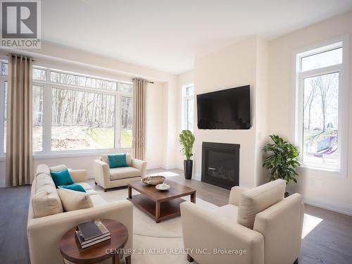 55 Bearberry Road N, Springwater, ON - Indoor Photo Showing Living Room With Fireplace