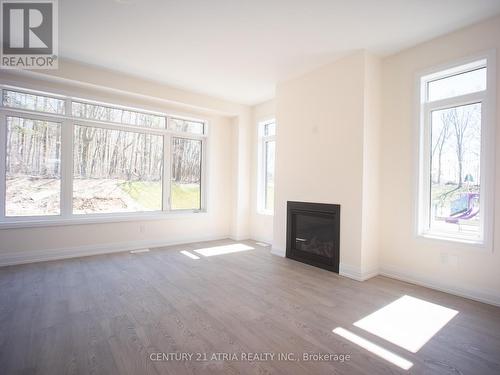 55 Bearberry Road N, Springwater, ON - Indoor Photo Showing Other Room With Fireplace