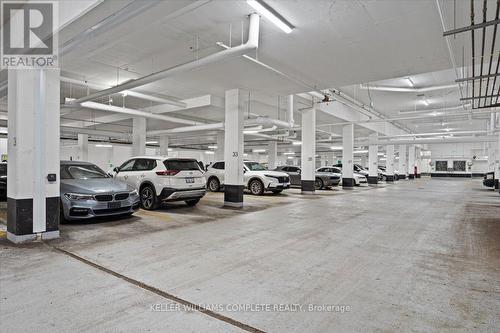 411 - 335 Wheat Boom Drive, Oakville, ON - Indoor Photo Showing Garage