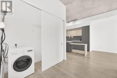 210 - 7 Smith Crescent, Toronto, ON - Indoor Photo Showing Laundry Room