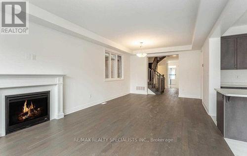Upper - 1271 Elderberry Crescent, Milton, ON - Indoor Photo Showing Living Room With Fireplace