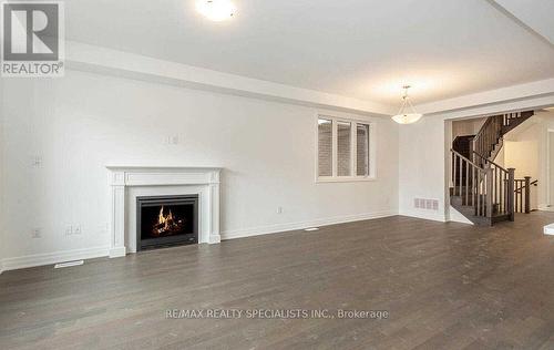 Upper - 1271 Elderberry Crescent, Milton, ON - Indoor Photo Showing Living Room With Fireplace
