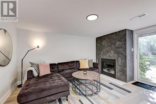 104 Dutch Myrtle Way, Toronto, ON - Indoor Photo Showing Living Room With Fireplace
