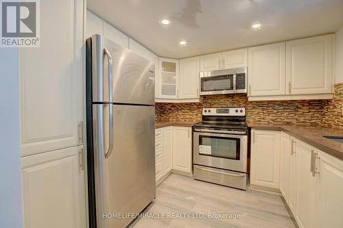 1405 - 325 Webb Drive, Mississauga, ON - Indoor Photo Showing Kitchen With Upgraded Kitchen