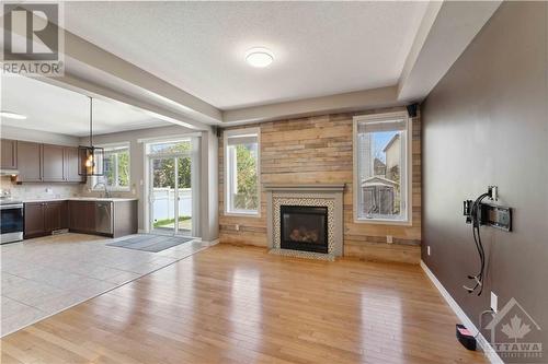 235 Burnaby Drive, Ottawa, ON - Indoor Photo Showing Living Room With Fireplace