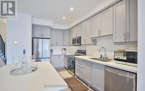 32 Bellhouse Avenue, Brantford, ON - Indoor Photo Showing Kitchen With Double Sink