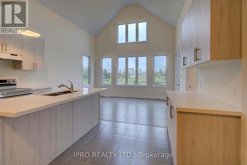 16 Oakmont Drive, Loyalist, ON - Indoor Photo Showing Kitchen With Double Sink
