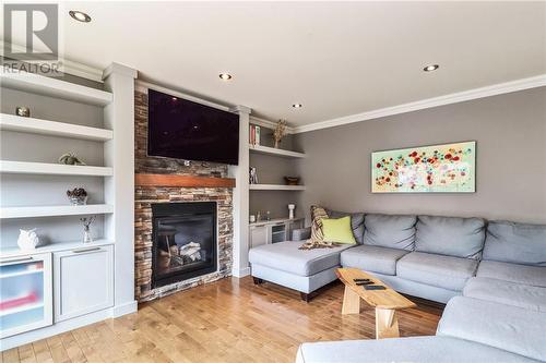 394 Belliveau Street, Dieppe, NB - Indoor Photo Showing Living Room With Fireplace