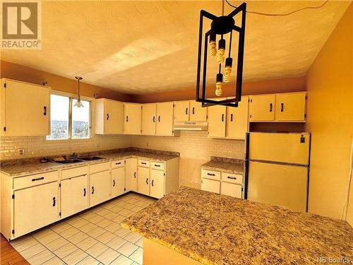 54 Cormier Street, Edmundston, NB - Indoor Photo Showing Kitchen