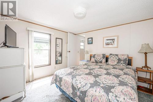 87 - 5216 County Road 90, Springwater, ON - Indoor Photo Showing Bedroom