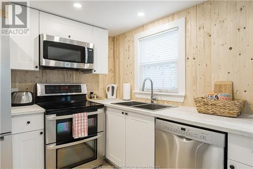67 Third Ave, Pointe Du Chene, NB - Indoor Photo Showing Kitchen With Stainless Steel Kitchen With Double Sink