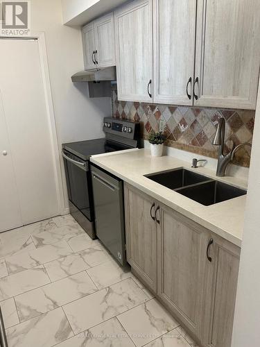 605 - 2261 Lake Shore Boulevard W, Toronto, ON - Indoor Photo Showing Kitchen With Double Sink