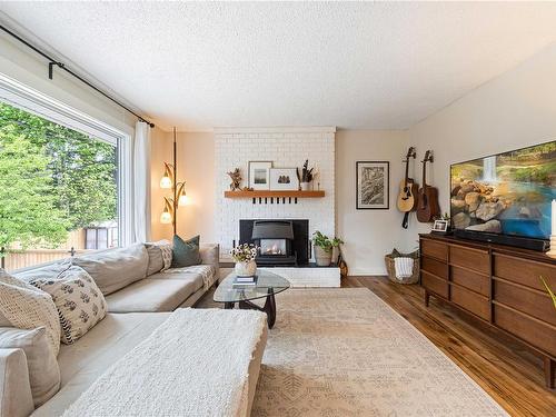 2720 Labieux Rd, Nanaimo, BC - Indoor Photo Showing Living Room With Fireplace