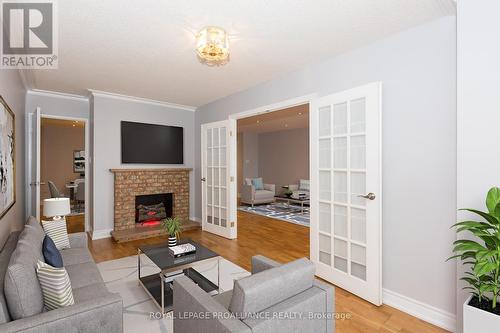 1604 - 3151 Bridletowne Circle, Toronto, ON - Indoor Photo Showing Living Room With Fireplace