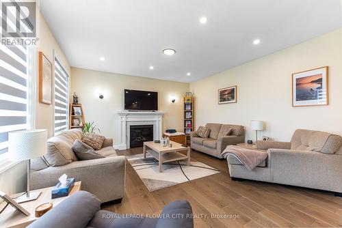 82 Optimist Drive, Southwold, ON - Indoor Photo Showing Living Room With Fireplace