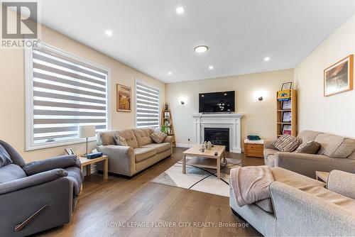 82 Optimist Drive, Southwold, ON - Indoor Photo Showing Living Room With Fireplace