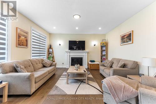 82 Optimist Drive, Southwold, ON - Indoor Photo Showing Living Room With Fireplace