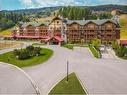 403 - 500 Stemwinder Drive, Kimberley, BC  - Outdoor With Facade With View 
