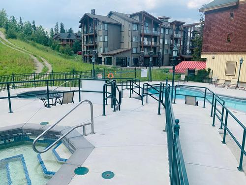 403 - 500 Stemwinder Drive, Kimberley, BC - Outdoor With In Ground Pool