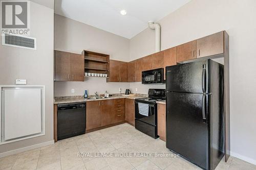 217 - 404 King Street W, Kitchener, ON - Indoor Photo Showing Kitchen With Double Sink