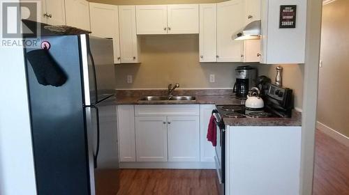 10209 17 Street Unit# 112, Dawson Creek, BC - Indoor Photo Showing Kitchen With Double Sink