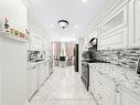 113-55 Elm Dr, Mississauga, ON  - Indoor Photo Showing Kitchen With Upgraded Kitchen 