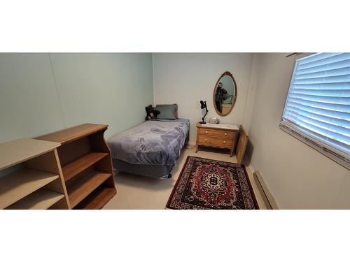 516 Slocan Avenue, New Denver, BC - Indoor Photo Showing Bedroom