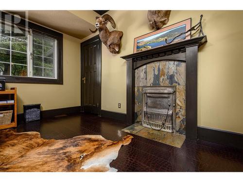 9310 Kalamalka Road, Coldstream, BC - Indoor Photo Showing Other Room With Fireplace