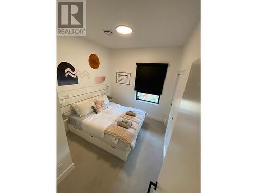 1701 Coursier Avenue Unit# 1107, Revelstoke, BC - Indoor Photo Showing Bedroom