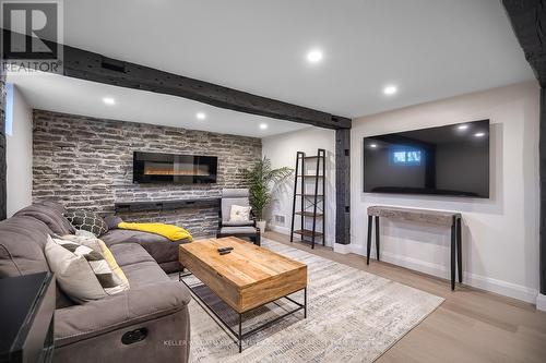 Lower - 1290 Minnewaska Trail, Mississauga, ON - Indoor Photo Showing Living Room With Fireplace