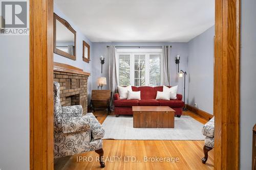 320 Queensdale Avenue, Toronto, ON - Indoor Photo Showing Living Room With Fireplace