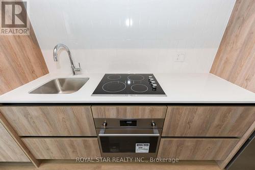 1611 - 7950 Bathurst Street, Vaughan, ON - Indoor Photo Showing Kitchen With Double Sink