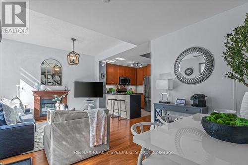 108 - 90 Absolute Avenue, Mississauga, ON - Indoor Photo Showing Living Room