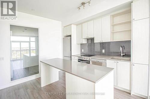 1016 - 50 George Butchart Drive, Toronto, ON - Indoor Photo Showing Kitchen With Upgraded Kitchen