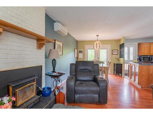 701 5Th Ave, Castlegar, BC - Indoor Photo Showing Living Room With Fireplace