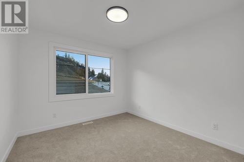 305 Arrowleaf Rise, Coldstream, BC - Indoor Photo Showing Other Room