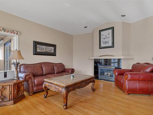 633 Middleton Way, Coldstream, BC - Indoor Photo Showing Living Room With Fireplace