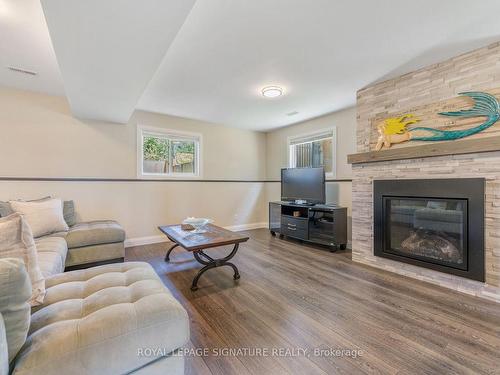 27 51St St S St, Wasaga Beach, ON - Indoor Photo Showing Living Room With Fireplace