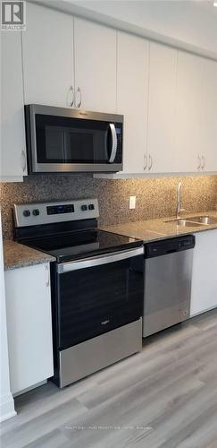512 - 3220 Sheppard Avenue E, Toronto, ON - Indoor Photo Showing Kitchen With Stainless Steel Kitchen