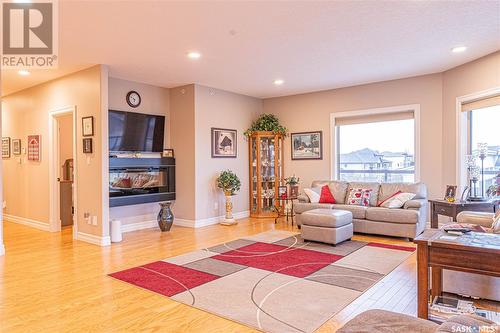 101 2800 Lakeview Drive, Prince Albert, SK - Indoor Photo Showing Living Room With Fireplace