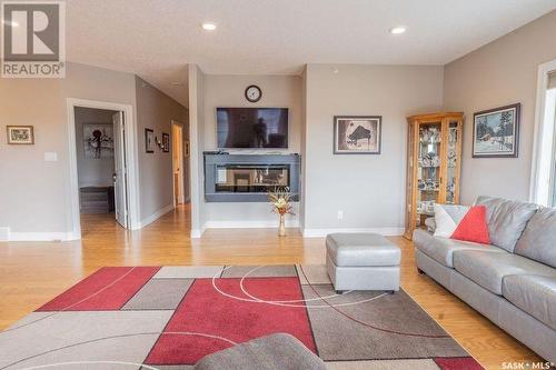 101 2800 Lakeview Drive, Prince Albert, SK - Indoor Photo Showing Living Room With Fireplace